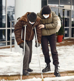 Walking with crutches on ice