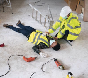 Worker attends to injured co-worker